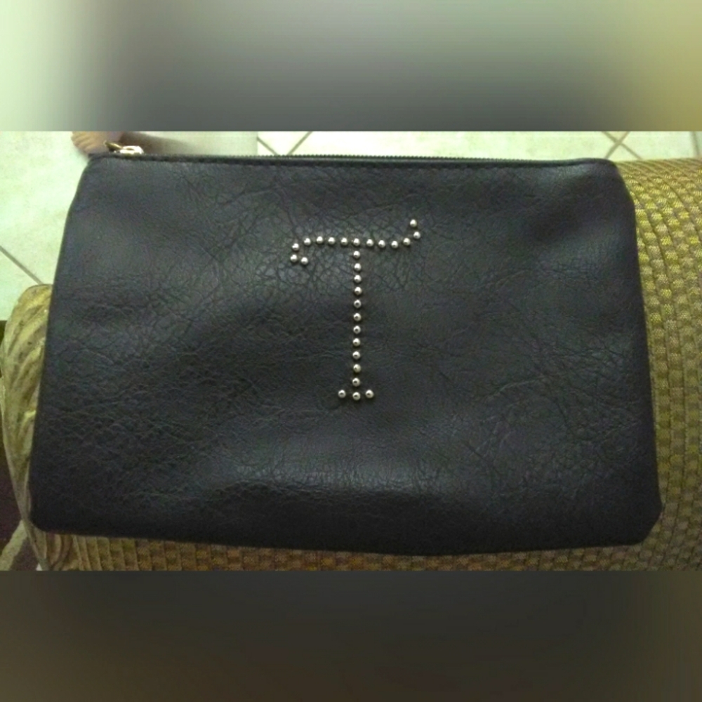 LIKE NEW COSMETIC BAG W/ SILVER STUD "T" ON THE FRONT VERY SOFT 8 X 6